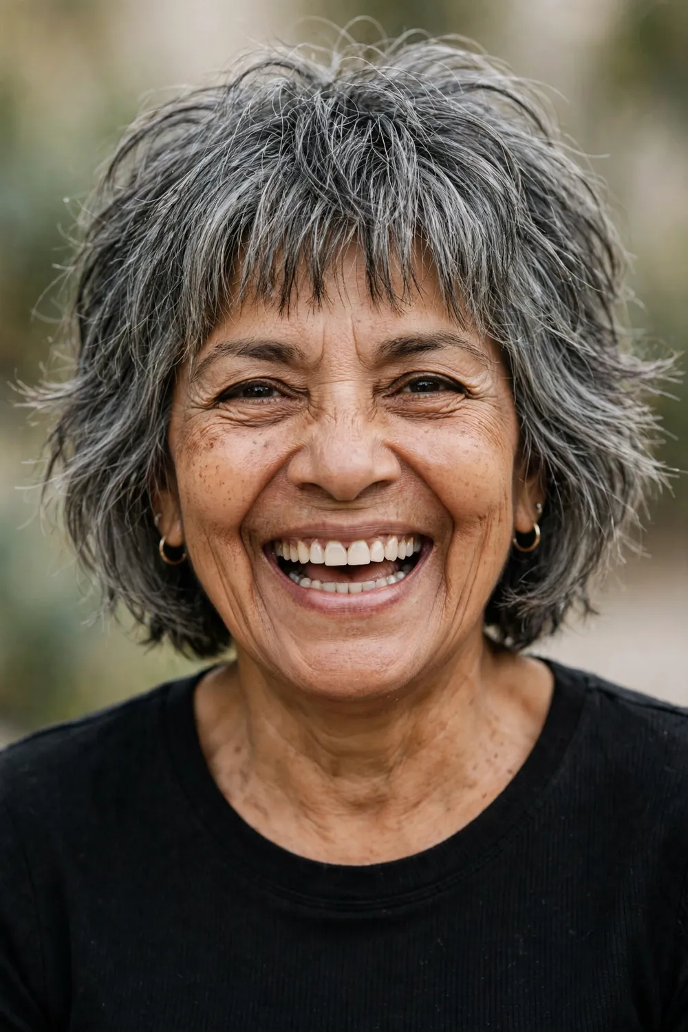 Mature woman with choppy fringe layered bob
