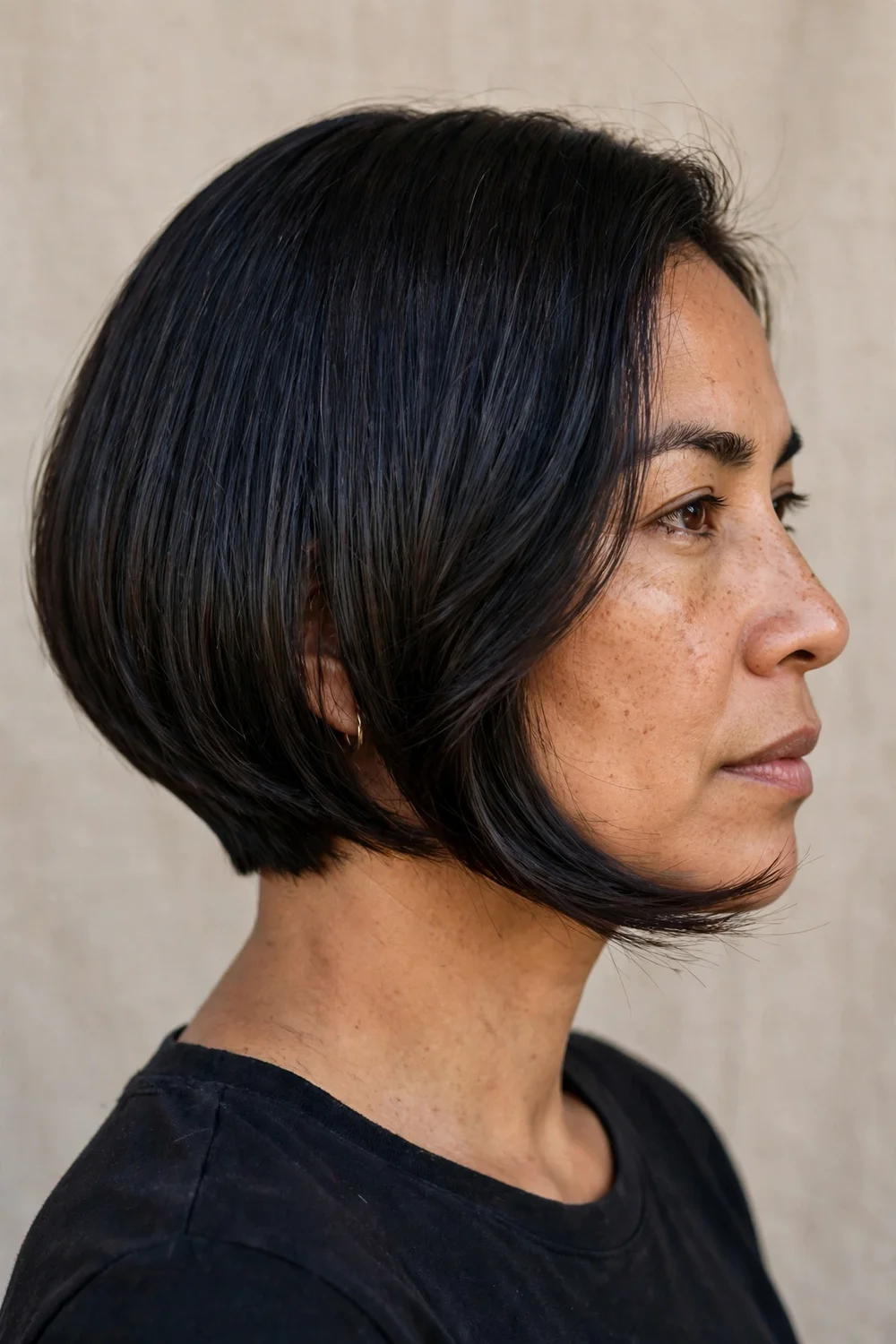 Smooth flowing inverted bob with sleek straight texture and clean angle
