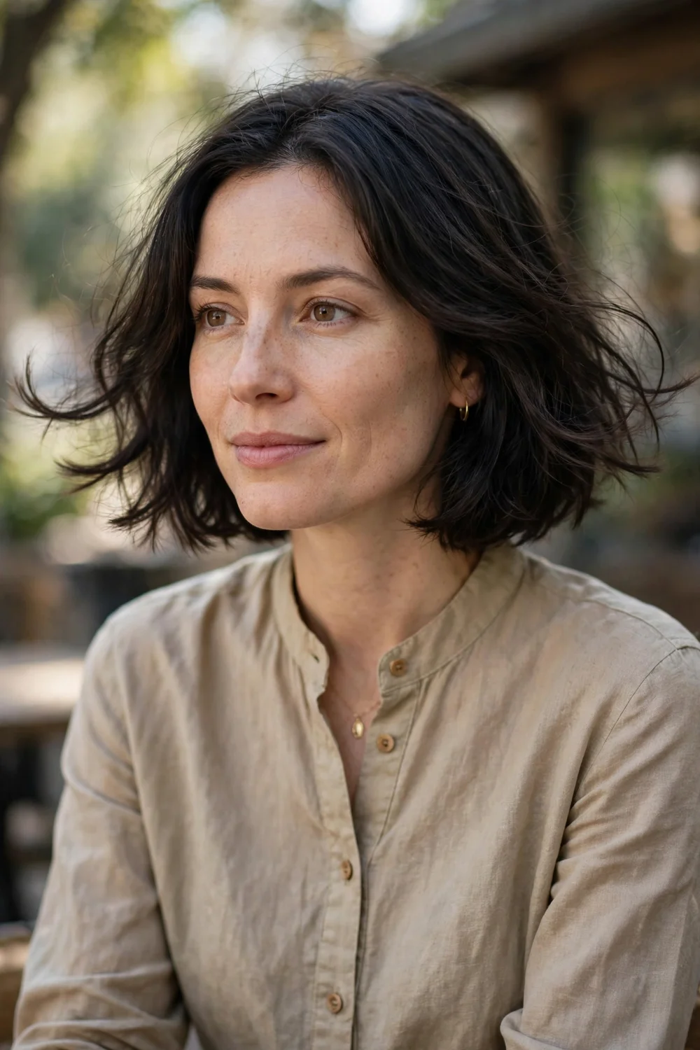Woman with a bob with flipped-out ends adding playful bounce to thin hair